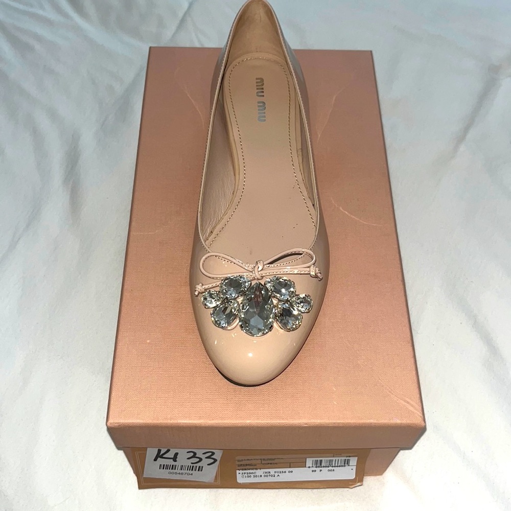 Miu Miu brand nude flats